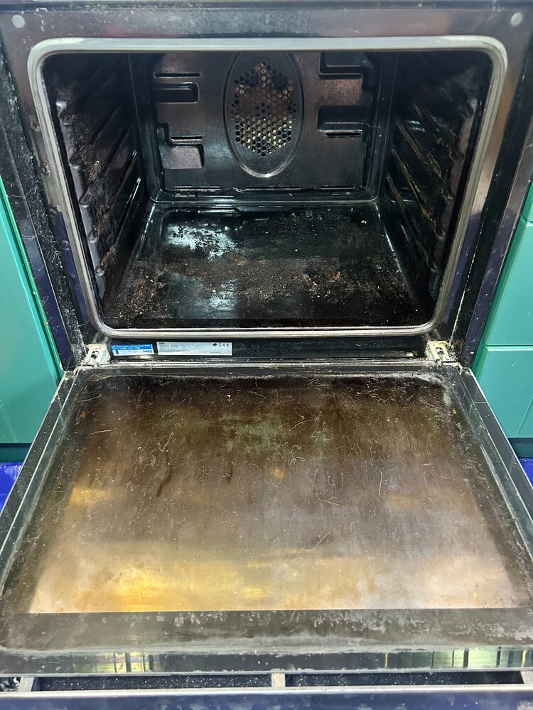 Customer oven interior before a precision clean